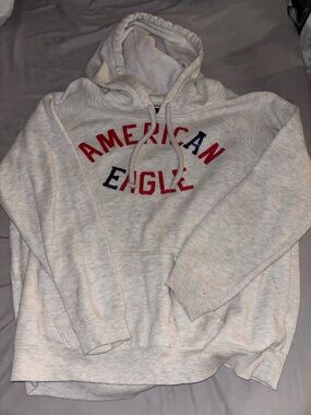 American Eagle Outfitters Cream Hoodie with Red and Navy Logo